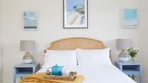 Another thoughtfully decorated bedroom with neutral colours creating a calming atmosphere. 