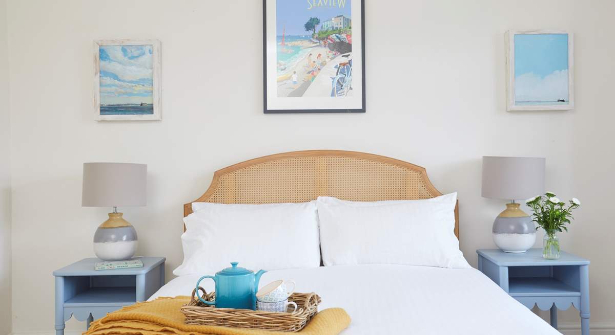 Another thoughtfully decorated bedroom with neutral colours creating a calming atmosphere. 