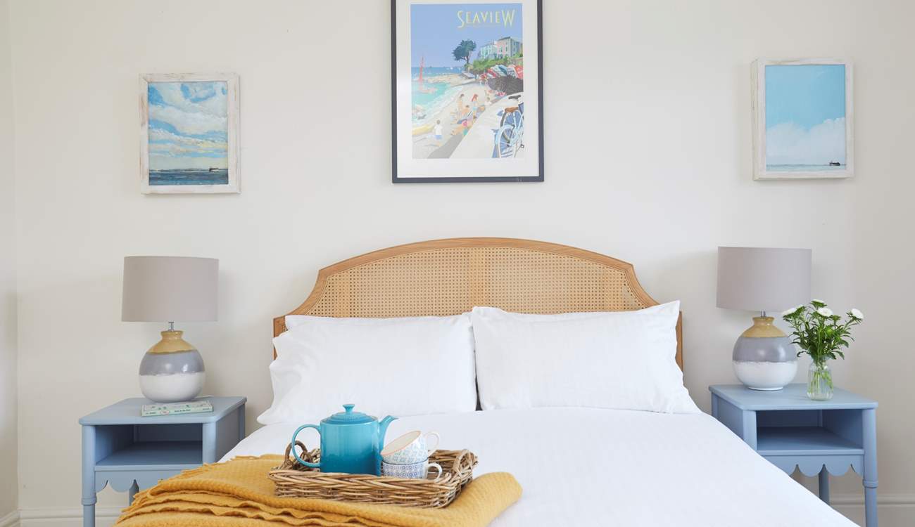 Another thoughtfully decorated bedroom with neutral colours creating a calming atmosphere. 