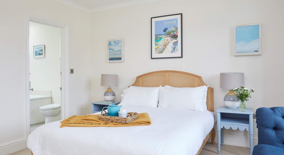 First floor bedroom with king-size bed...