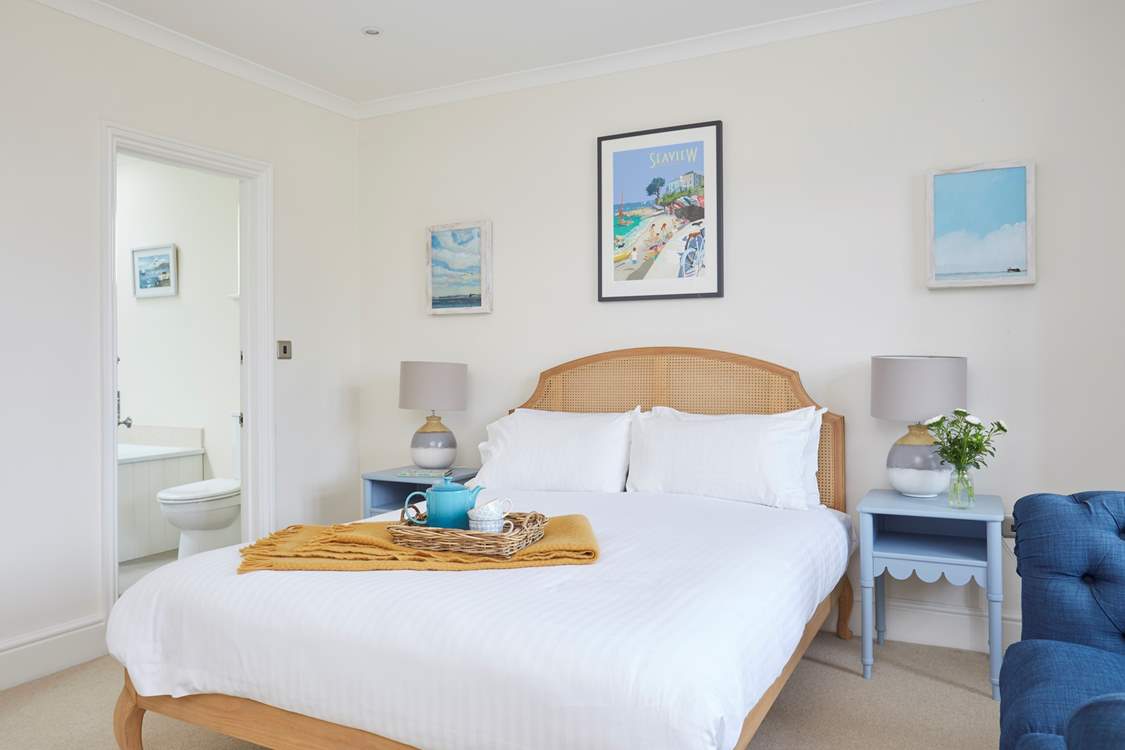 First floor bedroom with king-size bed...