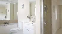 First floor family bathroom with separate shower.