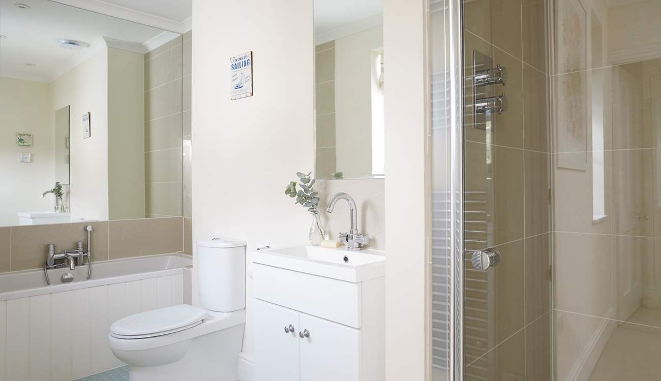 First floor family bathroom with separate shower.