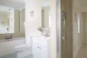 First floor family bathroom with separate shower.
