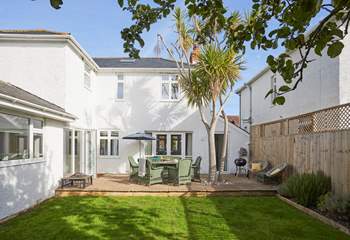 A lovely enclosed garden that everyone will enjoy spending time in.