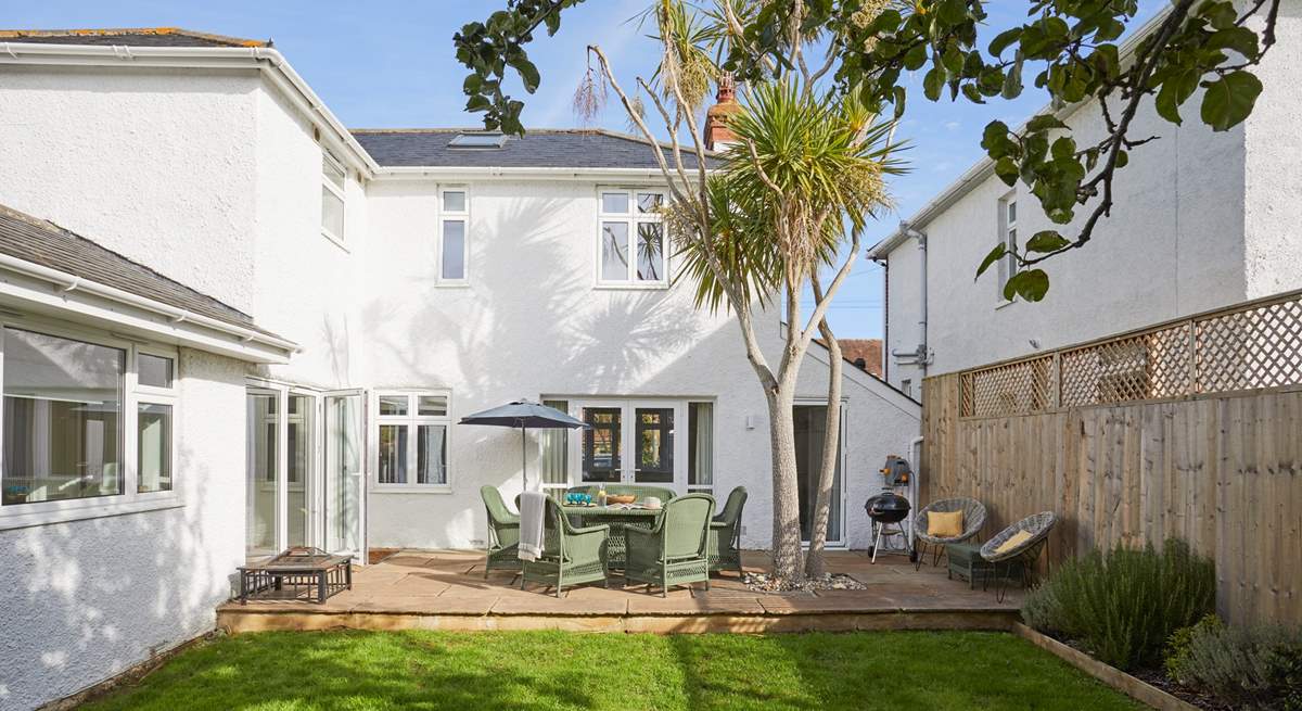 A lovely enclosed garden that everyone will enjoy spending time in.