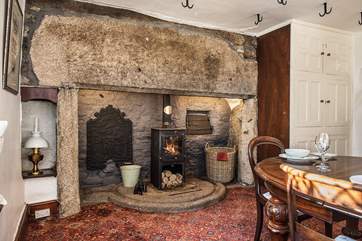 The dining-room has the mother of all fireplaces.