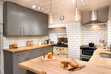 The kitchen has a modern, more contemporary feel.