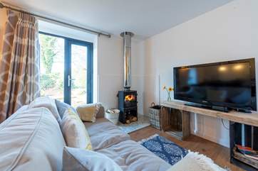 The warming wood-burner and squishy sofa make Little Woon an ideal retreat year-round.
