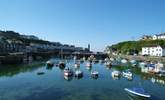 The pretty harbour at Porthleven is surrounded by cafes, small shops, pubs and restaurants (including Rick Stein's!). - Thumbnail Image