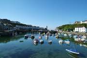 The pretty harbour at Porthleven is surrounded by cafes, small shops, pubs and restaurants (including Rick Stein's!).