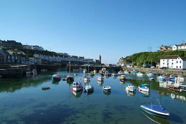 The pretty harbour at Porthleven is surrounded by cafes, small shops, pubs and restaurants (including Rick Stein's!).