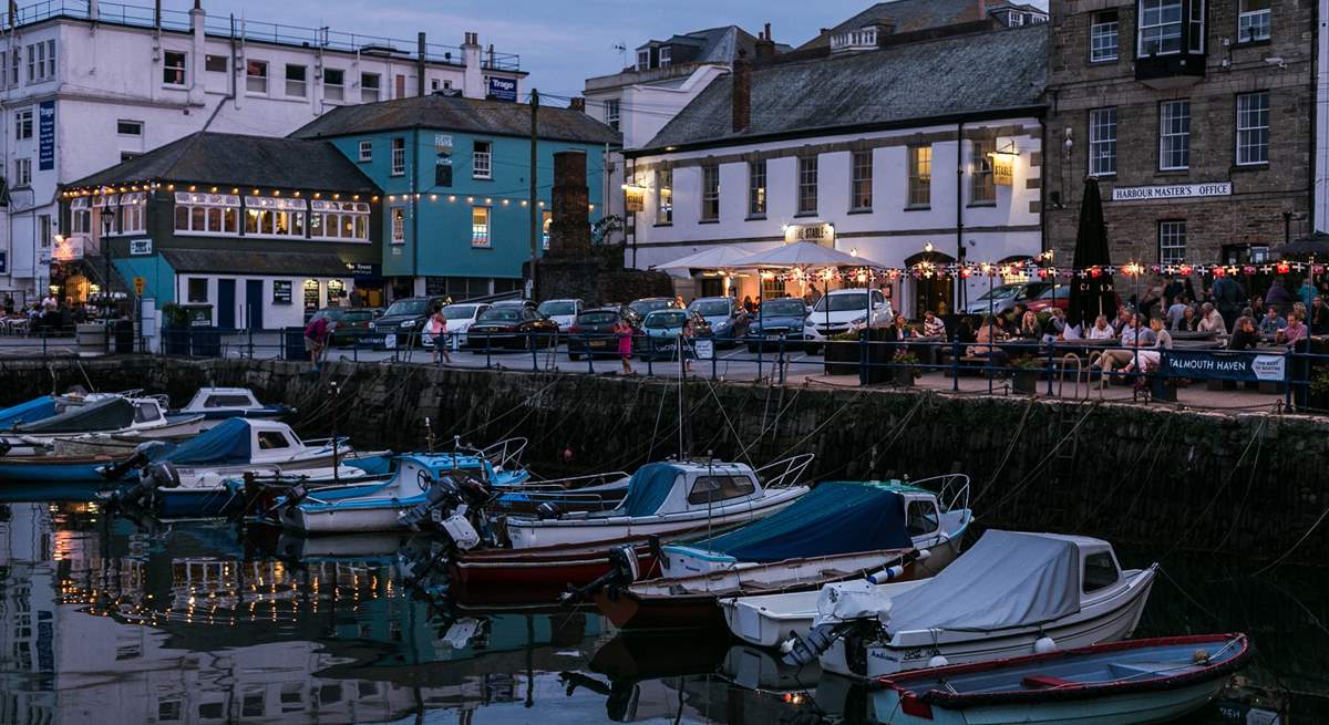 There are lots of great places to eat and drink in the maritime town of Falmouth, including Customs House Quay, pictured here.