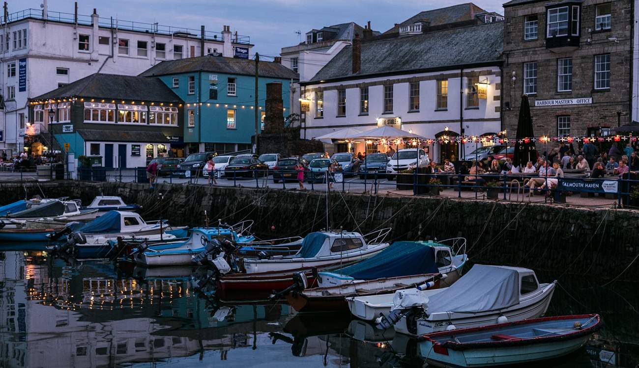 There are lots of great places to eat and drink in the maritime town of Falmouth, including Customs House Quay, pictured here.
