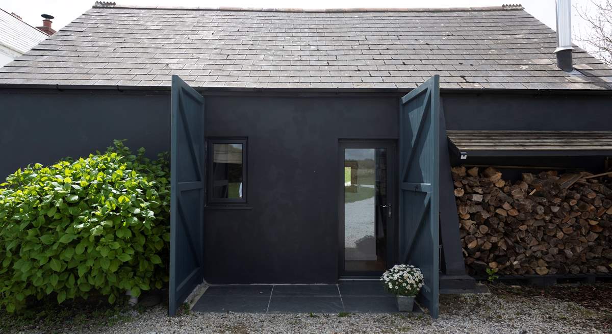 Open the barn doors up to reveal the entrance, step in and your holiday begins.