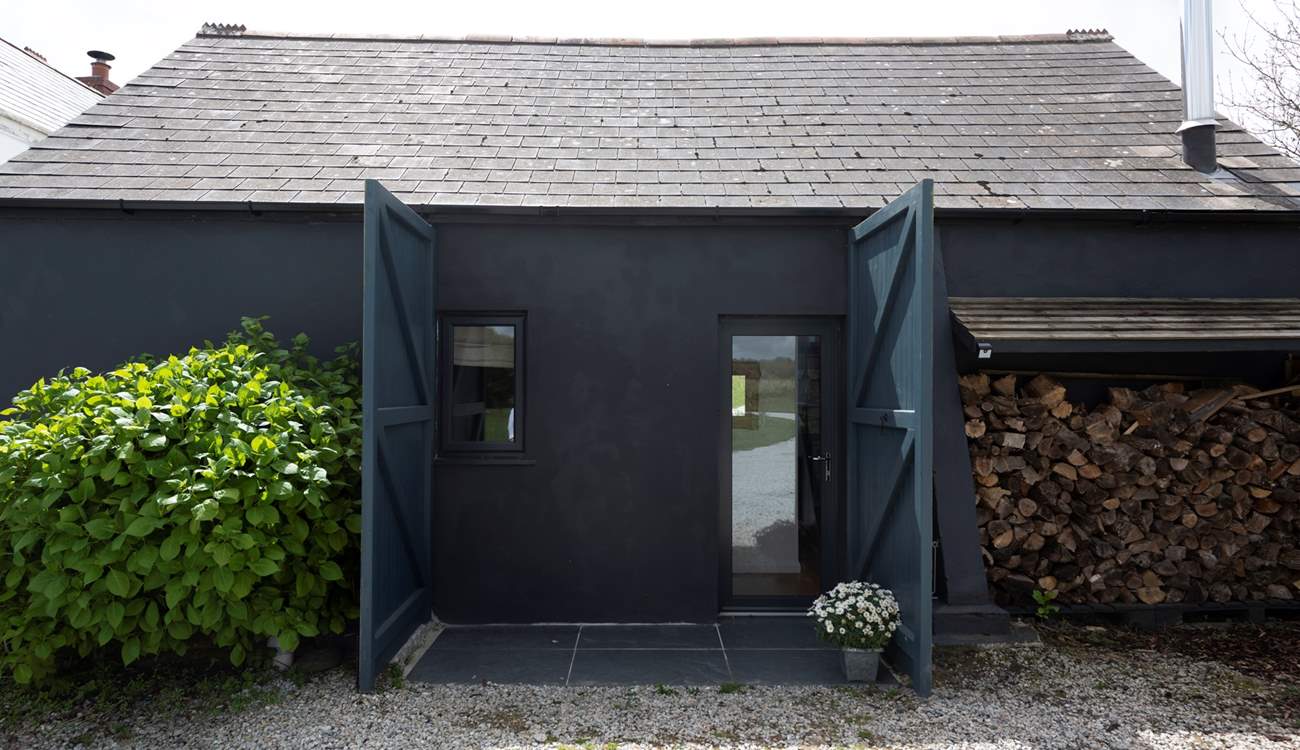 Open the barn doors up to reveal the entrance, step in and your holiday begins.
