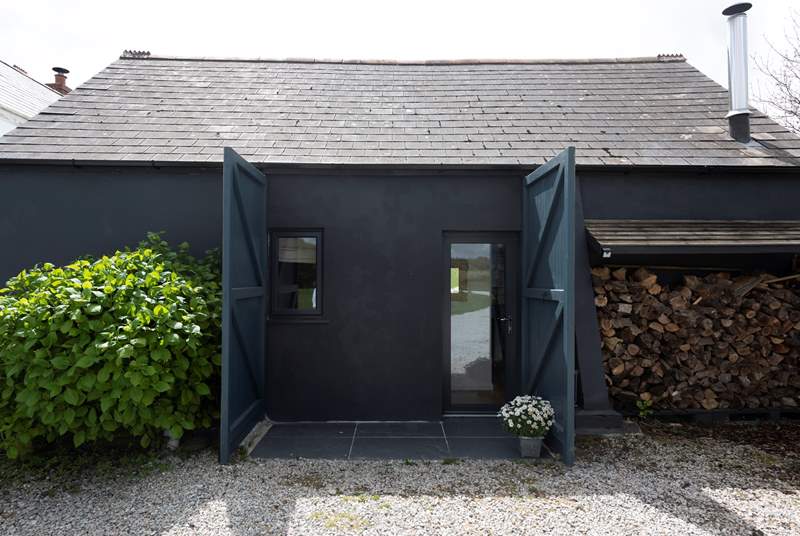Open the barn doors up to reveal the entrance, step in and your holiday begins.