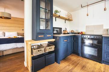 A large sliding door opens to the fabulous bedroom.