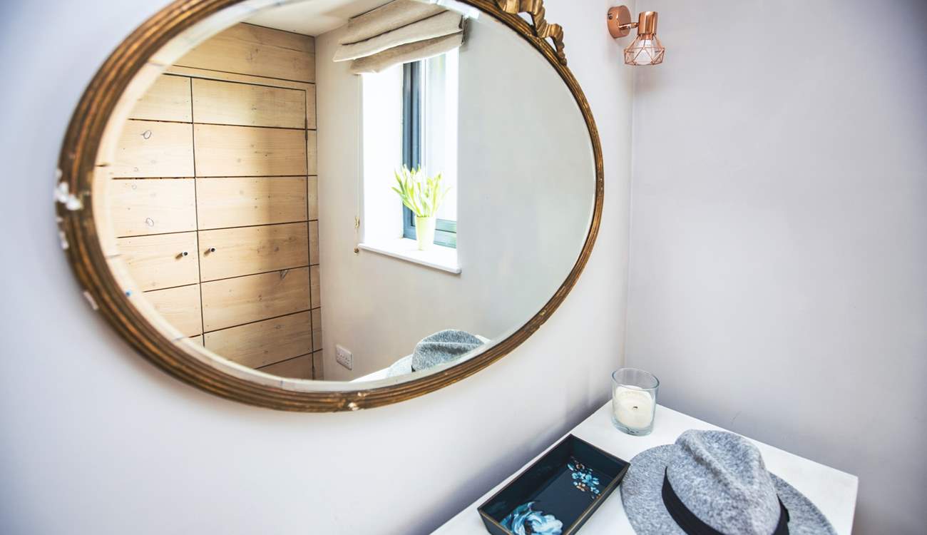 The bedroom has plenty of storage with a wardrobe and chest of drawers which is perfect for holidays in Cornwall. 