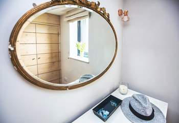 The bedroom has plenty of storage with a wardrobe and chest of drawers which is perfect for holidays in Cornwall. 
