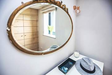 The bedroom has plenty of storage with a wardrobe and chest of drawers which is perfect for holidays in Cornwall.