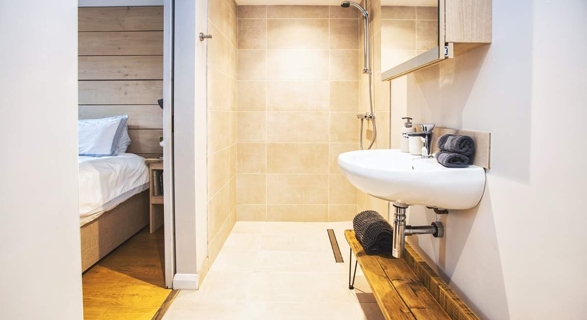 The en suite shower-room is a fabulous wet-room, perfect for a hot shower after a day in the surf. 