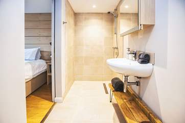 The en suite shower-room is a fabulous wet-room, perfect for a hot shower after a day in the surf.