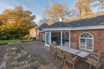 There is plenty of oustide space for the little ones with a patio and lawned area