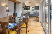 Looking back into the kitchen from the dining-area.