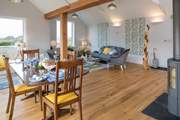 The open plan design gives the living space such a large and luxurious feel.