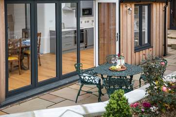 Your private patio-area offers this beautifully secluded spot to enjoy a touch of dining al fresco.