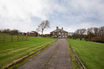 Once you turn into the grounds you will see the glorious neighbouring manor house! Follow the drive up to the end and prepare to be equally wowed on entering your holiday retreat.