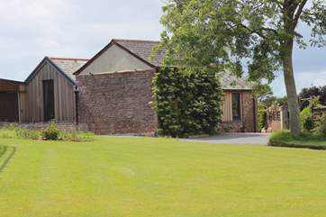 The Old Stables awaits you at the end of the drive. Please park up to the left of the property and prepare to be wowed!