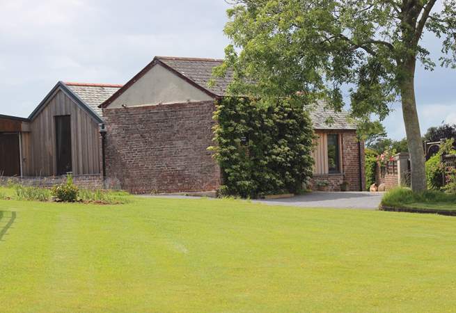 The Old Stables awaits you at the end of the drive. Please park up to the left of the property and prepare to be wowed!