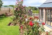 The landscaped garden boasts an array of colour. What a very special spot to sit and enjoy the sights and sounds of this beautiful location.