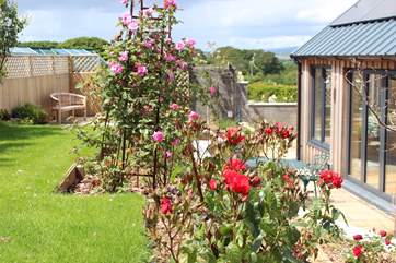 The landscaped garden boasts an array of colour. What a very special spot to sit and enjoy the sights and sounds of this beautiful location.