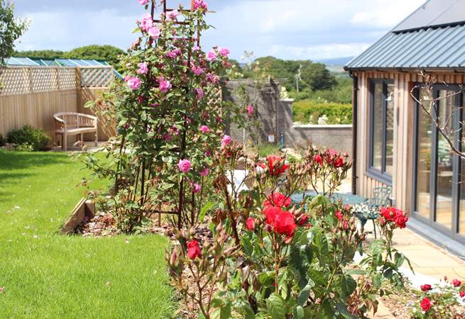 The landscaped garden boasts an array of colour. What a very special spot to sit and enjoy the sights and sounds of this beautiful location.