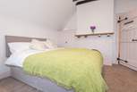 Bedroom four, another zip and link king-size or twin beds, also on the first foor to the rear of the property and overlooking the garden