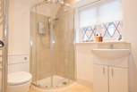 The modern first floor bathroom with bath and separate shower cubicle