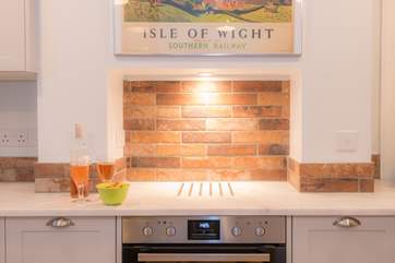With a double oven in this stunning and well-equipped kitchen you can cook up a storm here