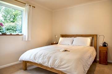 Relax with a good book in bed (Bedroom 2).