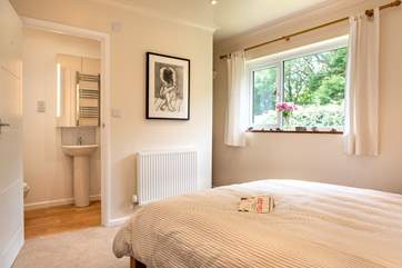 This bedroom has an en suite shower-room (Bedroom 2).