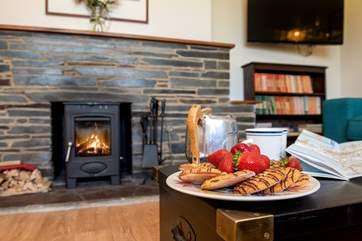 Cosy up in front of the fire.