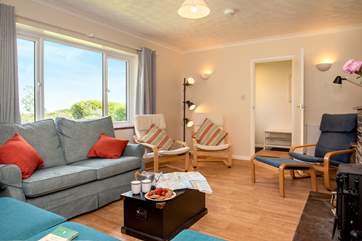 The sitting-room is filled with bright colours.
