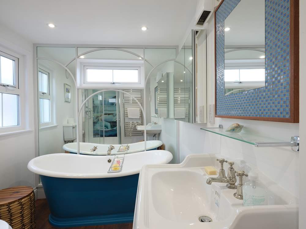 Relax in the roll-top bath.