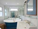 Relax in the roll-top bath.