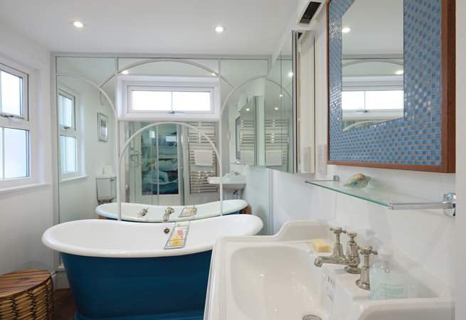 Relax in the roll-top bath.