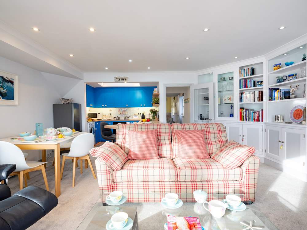 The lovely light-filled open plan living-room.
