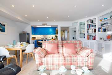 The lovely light-filled open plan living-room.