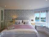Bedroom 1 has an en suite bathroom, and the king-size bed has replaced by a super-king bed.